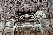 Bangkok Wat Pho, detail of the statue of chinese style door guardians of the gates of the walls of the temple. 